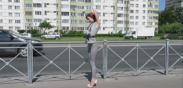  Sexy Natalia walks down the street in tight leggings